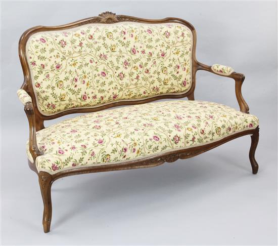 A French Louis XVI style walnut settee, W.4ft 7in. H.3ft 6in.